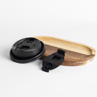 Black and transparent plastic lids for coffee cups