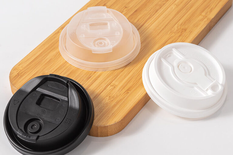 Black and transparent plastic lids for coffee cups