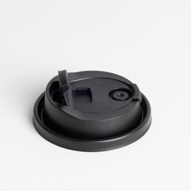 Black and transparent plastic lids for coffee cups