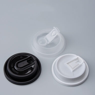 Black and transparent plastic lids for coffee cups